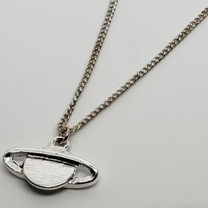 Silver ufo necklace